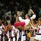 Summitt is carried off the court after winning gold at the 1984 Olympics in Los Angeles. (Pete Leabo/AP Images)